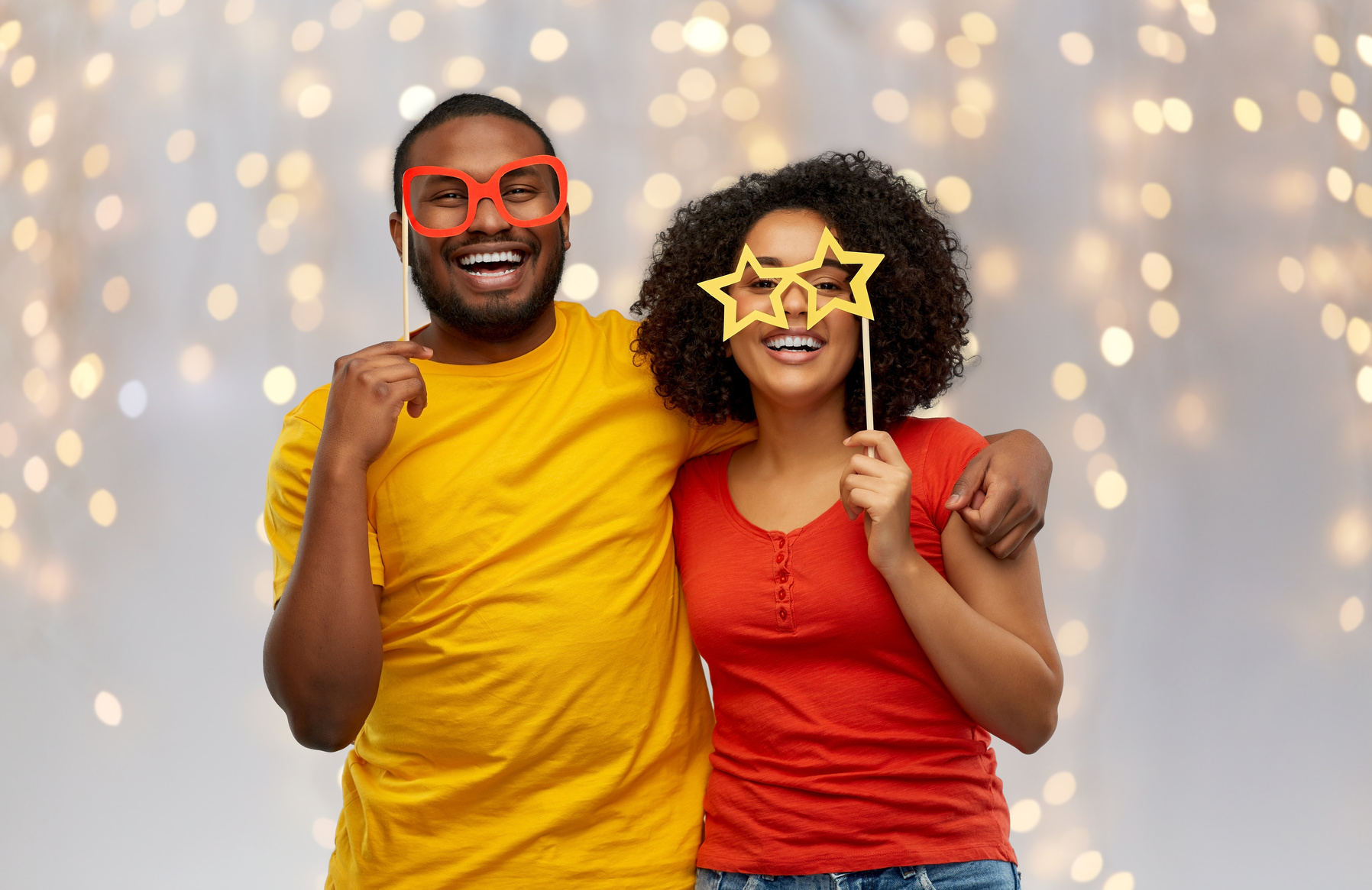 Happy African American Couple with Party Props